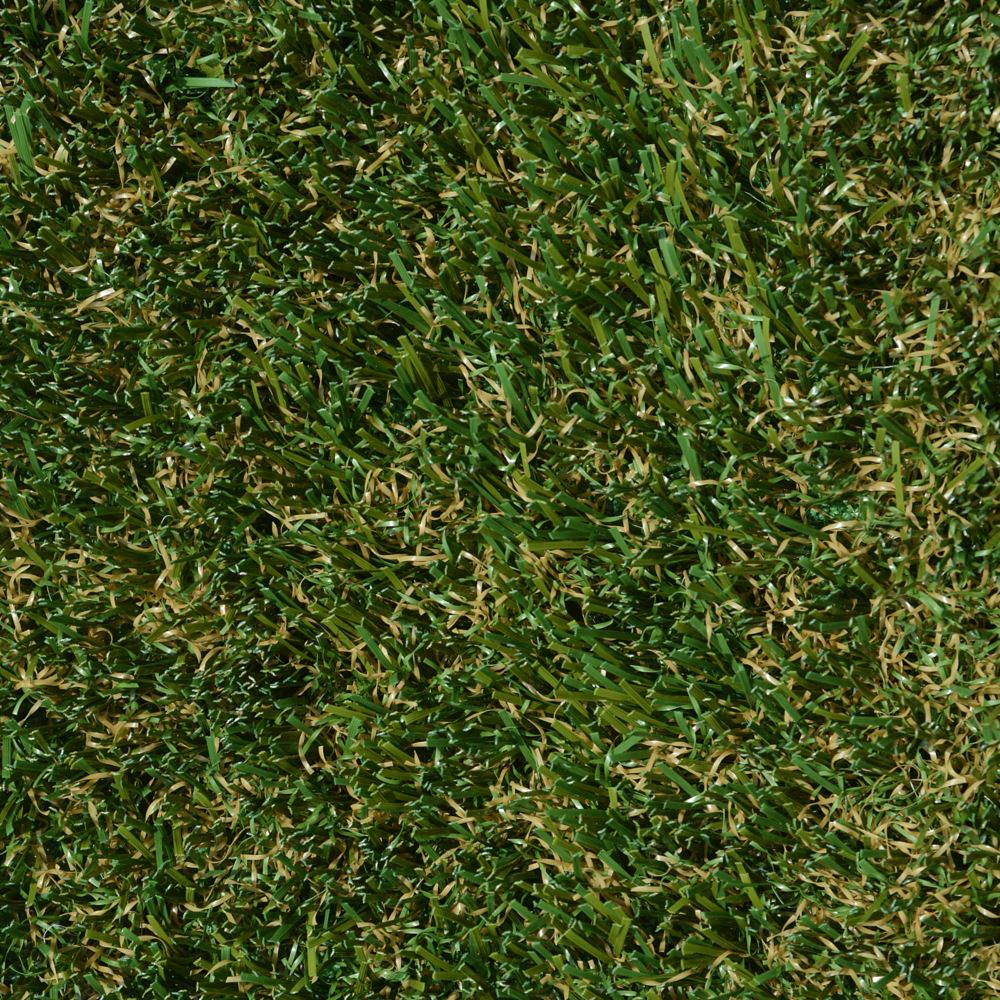 A close up image of artificial grass with green and brown